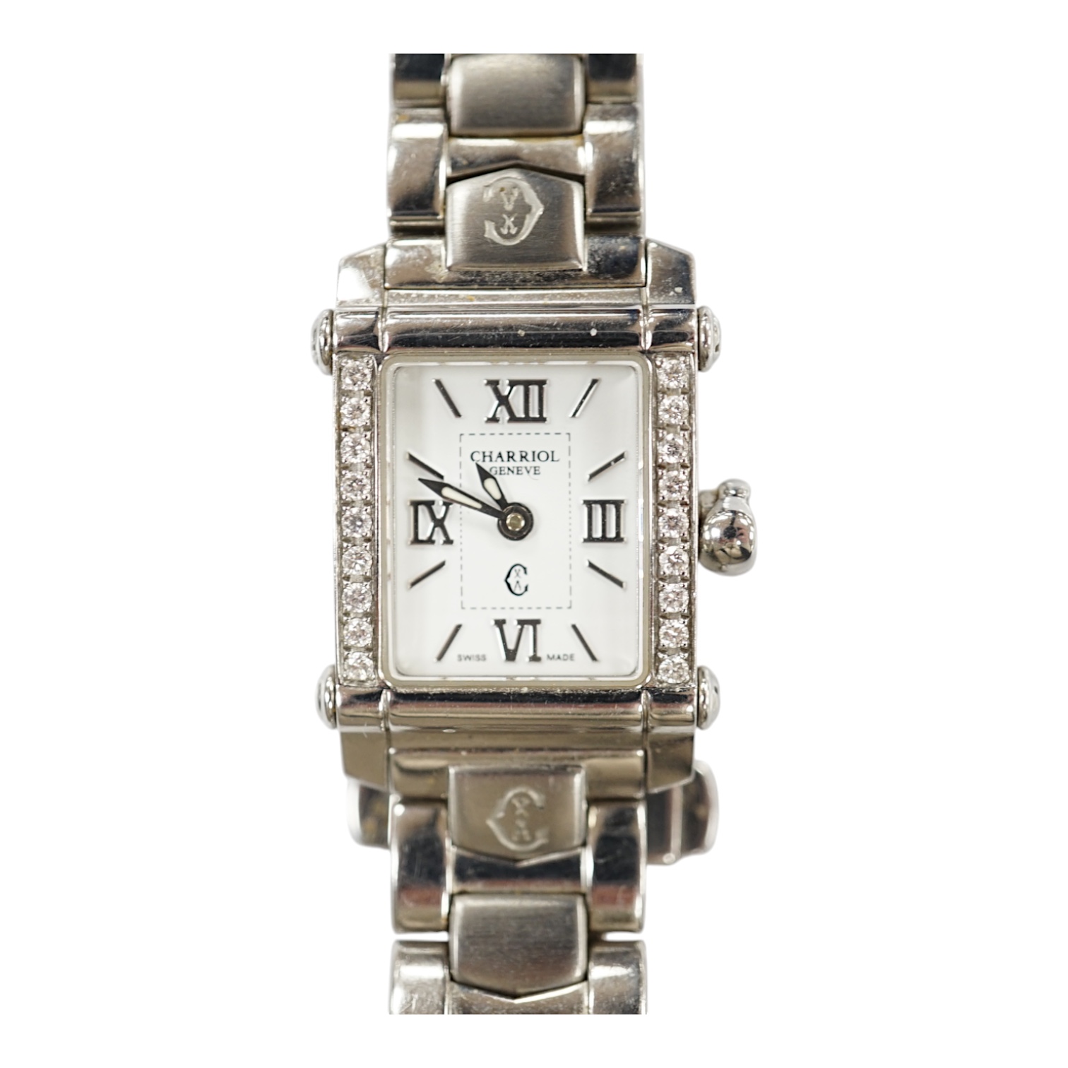 A lady's stainless steel Charriol Columbus quartz wrist watch with rectangular dial and diamond chip set bezel, on a stainless steel bracelet. Condition - fair